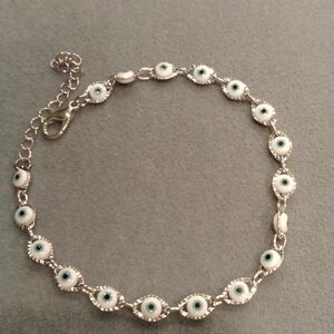 Evil eye diamond cut high polished silver bracelet. nwot